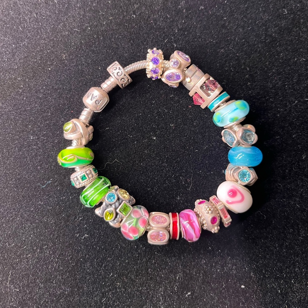 Assorted Pandora beads on a Pandora chain- sterling silver